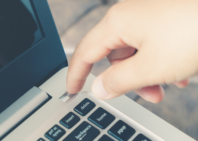 Turning the power off on a computer.